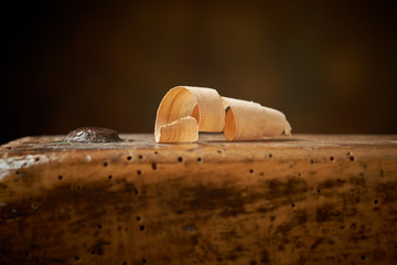 Hand plane on a wooden workbench.