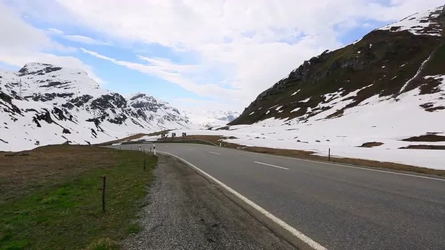Fast motion shot of motorcycles moving on a road, St. Moritz, Engadine Valley, Switzerland