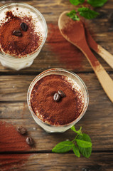 Traditional italian cake tiramisu with cookie and coffee