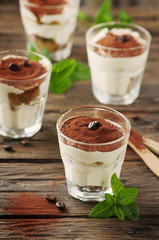 Traditional italian cake tiramisu with cookie and coffee