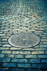 Old cobblestone street with vintage tone filter effect