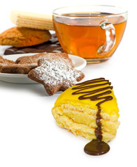 Isolated image of a cup of tea and cookies on a white background