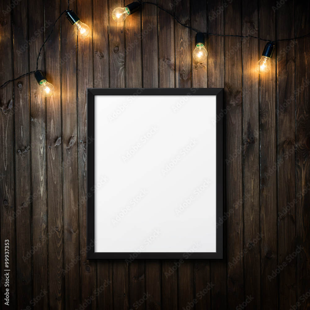 Wall mural poster on wooden background with light bulbs