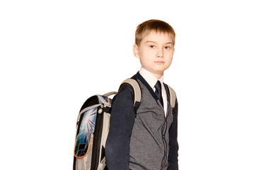 Schoolboy with bag isolated on white background.