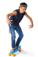 Cute blonde boy or teenager in full length casual style blue jeans posing and showing thumbs up isolated on white