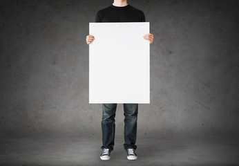 close up of man holding big blank white board