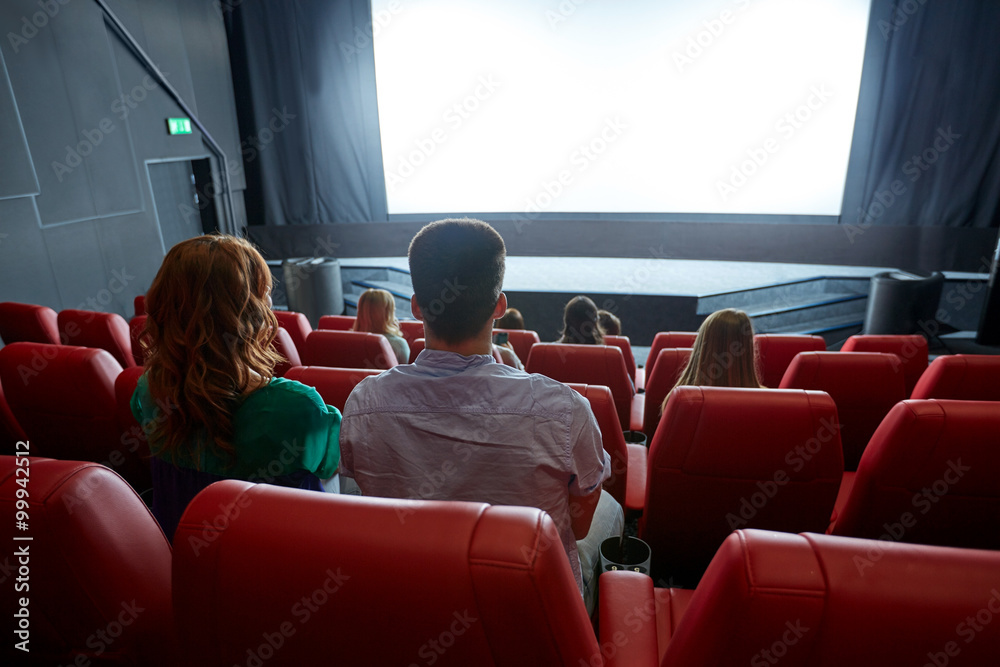 Poster happy couple watching movie in theater or cinema