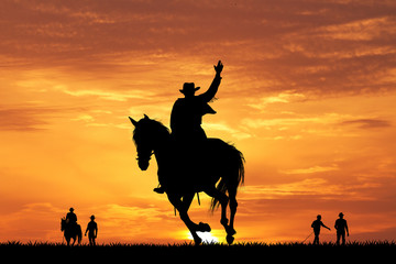 rodeo cowboy silhouette at sunset - obrazy, fototapety, plakaty