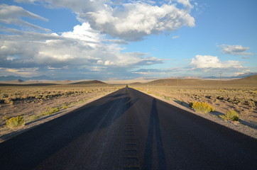 Fototapeta na wymiar Long Straight Desert Highway
