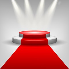 Obraz premium Red carpet to podium stage with spotlights
