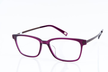 purple glasses on white background