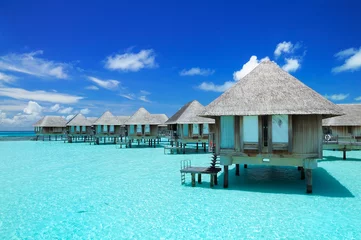 Foto auf Acrylglas Asien Maledivische Wasserbungalows