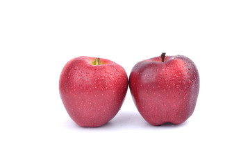 Red ripe apples on white background.