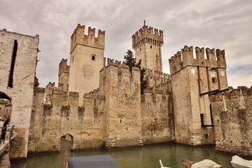 Fototapeta na wymiar Castle in Sirmione, with its moat,Italy