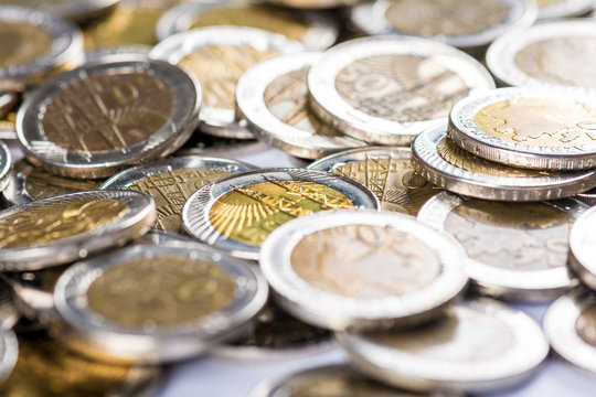 Azerbaijan currency. Pile of 50 qepik coins. Selective focus