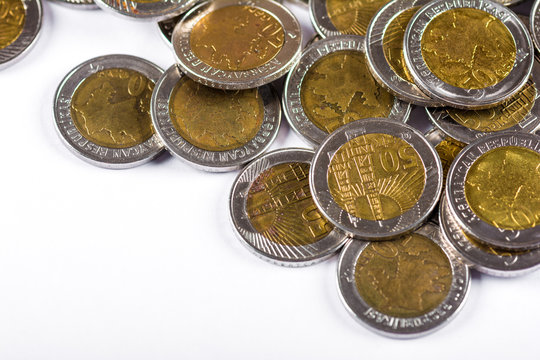 Azerbaijan currency. Pile of 50 qepik coins. Selective focus