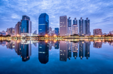 Fototapeta na wymiar Bangkok city downtown at morning with reflection of skyline, Thailand