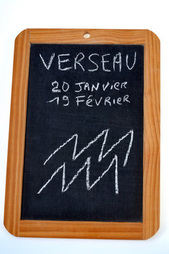 Ardoise avec signe du verseau