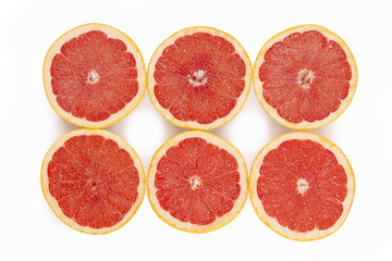 six beautiful tasty red grapefruit isolated on white