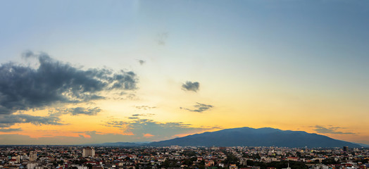 City and mountain in evening