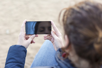 Woman use of the mobile phone