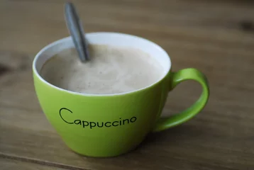 Fotobehang een kop cappuccino © Carmela