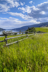 Old Wooden Farm Fence at Scenic Lake Shore