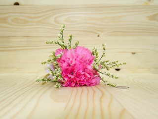 small bouquet on wooden background