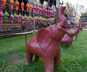 Monkey figurine in front of Wat Lok Mo Li in Chiang Mai, Thailand