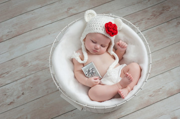 Baby Wearing a Christmas Bear Hat