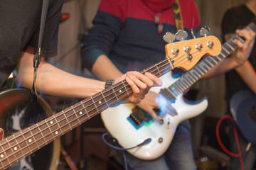 aggressive play guitar on stage