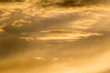 Naklejka na ściany i meble beautiful clouds dawn sun