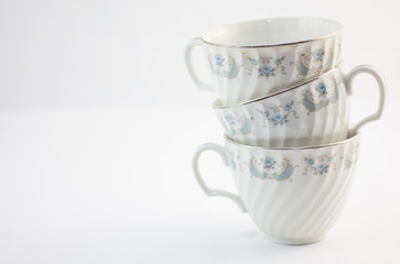 three tea cups on a white background 