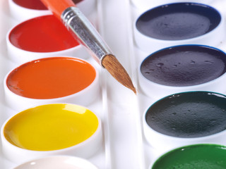 Watercolor brushes in a white box