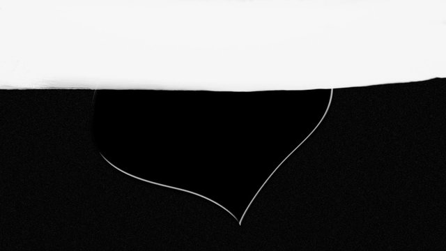Hand drawn white heart on black background painted over with white paint. Completely white screen at the final of clip. Valentines day artistic background.
