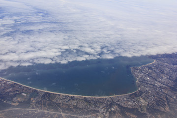 Aerial view of the California coast with clouds