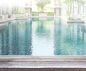 Wood Table Top of Background and Pool