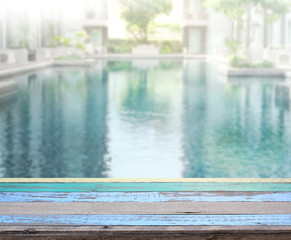 Wood Table Top of Background and Pool