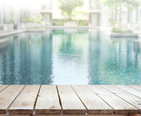 Wood Table Top of Background and Pool