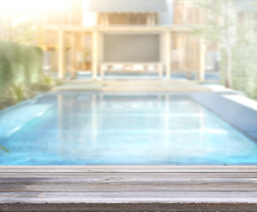 Wood Table Top of Background and Pool