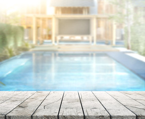Wood Table Top of Background and Pool