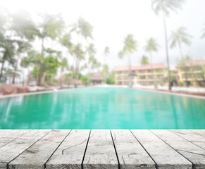 Wood Table Top of Background and Pool