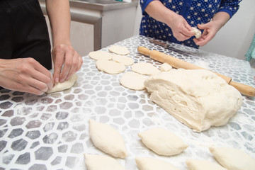 cooking cakes of the dough in the kitchen