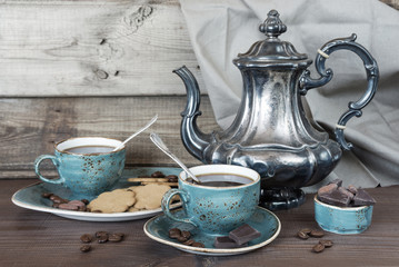 Two cups of black coffee