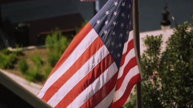 Slow motion view of a flag waving.