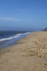 Blue sky and beach on Cape Cod at Wellfleet, Massachusetts.
