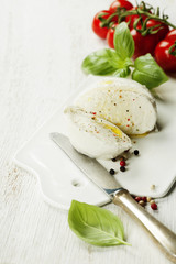 mozzarella, organic cherry tomatoes and fresh basil