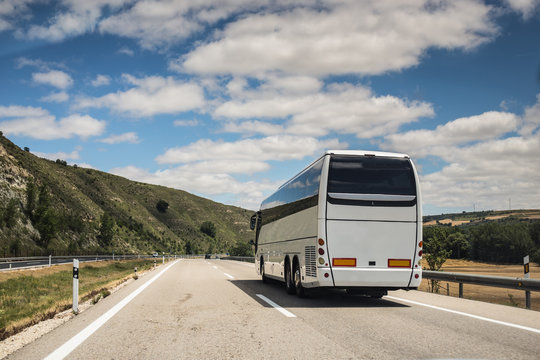 Coach, long haul bus, drives through Spain