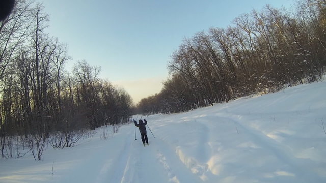 Father and son skiing in the woods, GoPro crash
