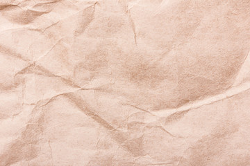 Crumpled retro brown paper texture.